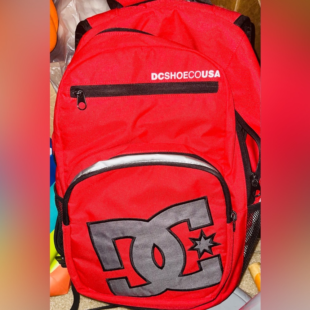 Nice , excellent condition DC RED Back Pack with multiple compartments